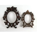 Two Black Forest oval picture frames, the largest overall 36 by 43cms (14 by 17ins) (2).