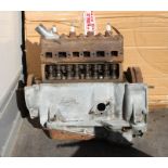 An Austin 7 engine, engine number M201264, internal condition unknown.