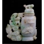 A Chinese green figured jade / hardstone vase & cover with dragon and phoenix decoration and fo