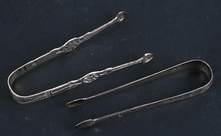 A pair of George III silver sugar tongs, marks rubbed; together with a similar pair, weight 56.8g (