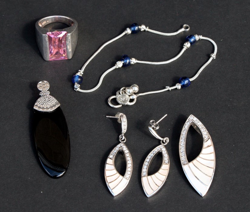 A silver & onyx pendant; together with a silver & mother of pearl pendant; and other silver