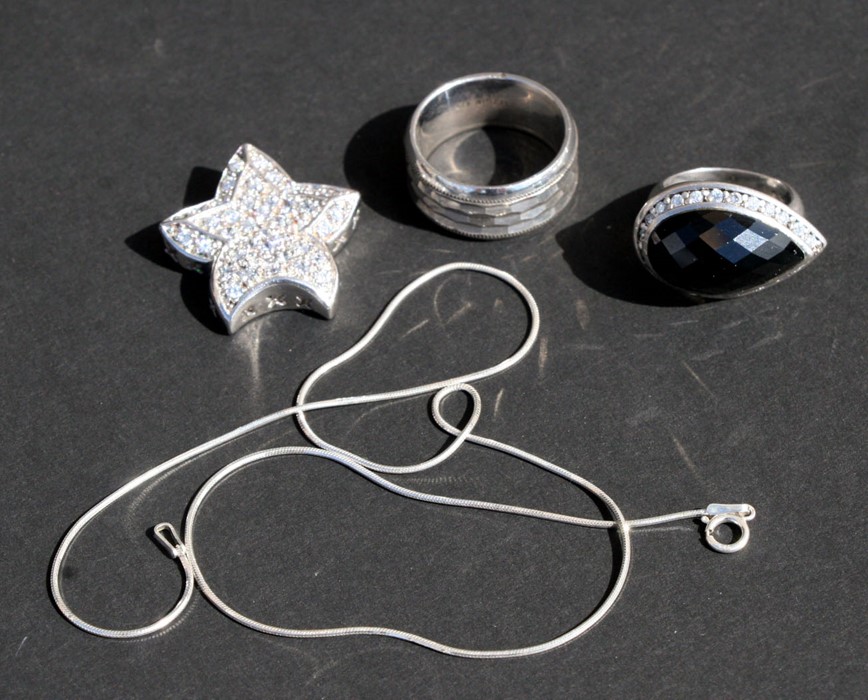 A silver star pendant; together with other silver jewellery.Condition Report33g