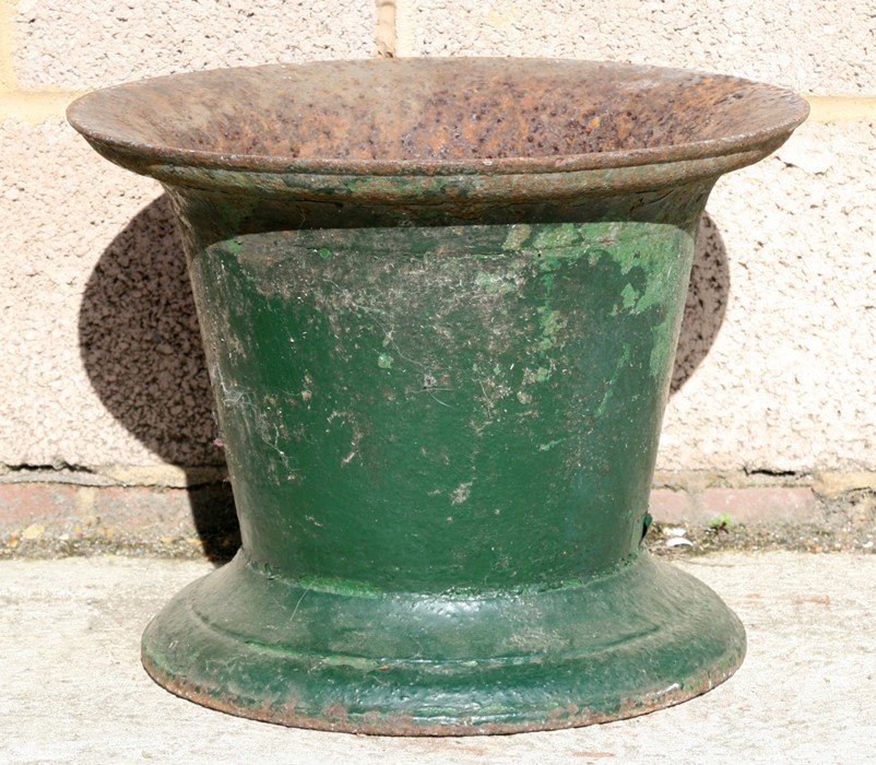 A large George III green painted iron mortar, 38cms (15ins) diameter.
