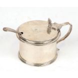 A William IV silver mustard pot, London 1835, weight 142g, 6.5cms (2.5ins) high.Condition