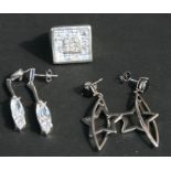 Two pairs of silver earrings; together with a silver ring.Condition Report27g