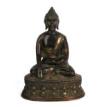 A Chinese bronze Buddha seated in meditation, 20cms (8ins) high.