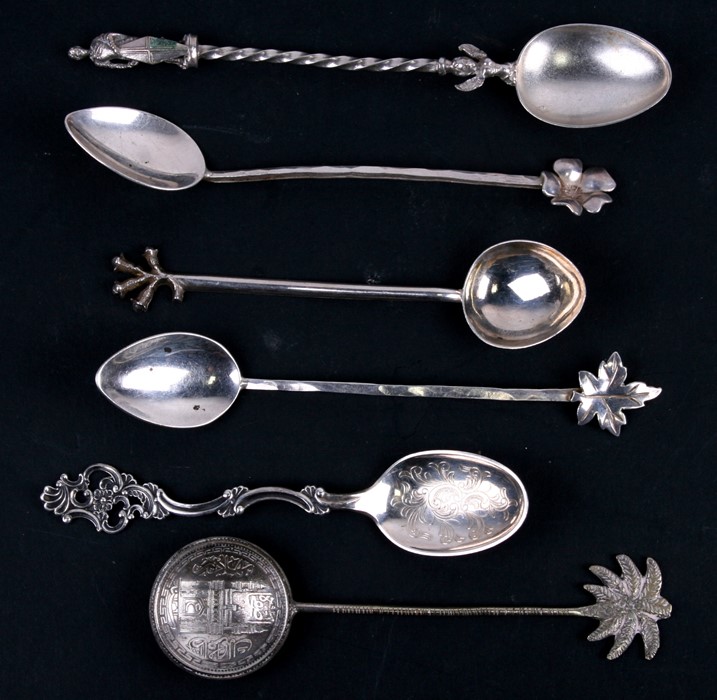 Six continental silver novelty teaspoons.