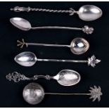 Six continental silver novelty teaspoons.