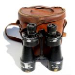 A pair of WWII Ross binoculars, number 22607, with soldier's name 'R Cruse' inscribed to the body;