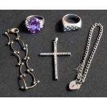 A quantity of silver jewellery to include a crucifix, two bracelets and two rings (5).Condition