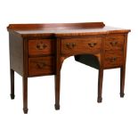 An early 19th century mahogany breakfront sideboard of small proportions, on square tapering legs