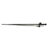 A 17th century sword with brass finger guard and faux antler grip, 92cms (36.25ins) long.Condition