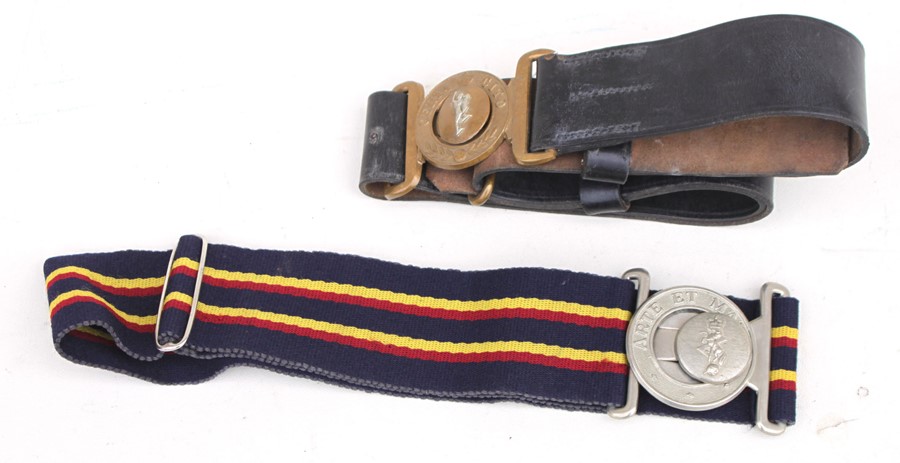 A Royal Corps of Signals black leather belt with brass buckle together with a Royal Electrical &