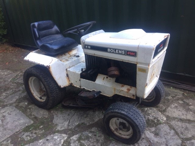 A 1980's Bolens FMC H16 mini tractor