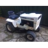 A 1980's Bolens FMC H16 mini tractor