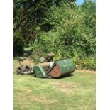 A Dennis grounds keeper ride on lawnmower.