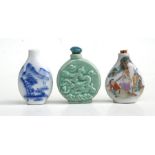 A Chinese snuff bottle decorated with a sage and figures; together with two similar (3).