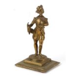 A continental bronze figure depicting a huntsman, 11cms (4.25ins) high.