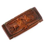 A 19th century coquilla nut snuff box, finely carved with Cupid, 7.5cms (3ins) wide.