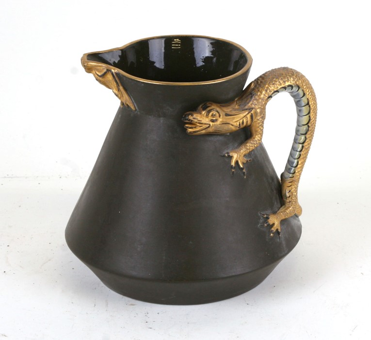 A Victorian Worcester jug with dragon form handle, 14cms (5.5ins) high.