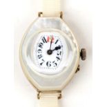 An Art Deco ladies mother of pearl cased wrist watch, the white enamel dial with arabic numerals