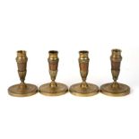 A set of four Regency candlesticks. 13cm (5 ins) highCondition ReportGood overall condition