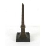 A 19th century bronze Grand Tour style Egyptian obelisk, 26cms (10.25ins) high.Condition Reportit