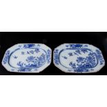 A pair of 18th century Chinese blue and white dishes of elongated octagonal form, decorated birds