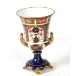 A Royal Crown Derby Imari pattern Campana vase, 15cms (6ins) high.