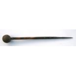 An African tribal hardwood club with steel tip, the globular end studded with iron, 85cms (33.