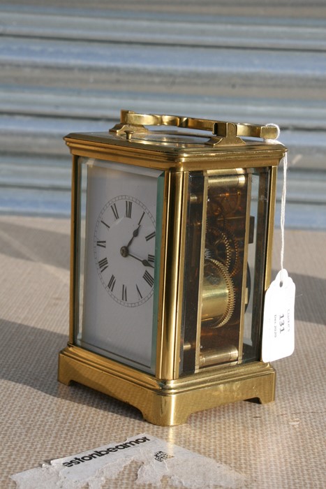 A brass cased repeater carriage clock, the white enamel dial with Roman numerals, the movement - Image 3 of 7