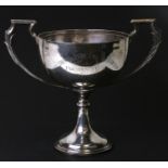 A large silver two-handled trophy cup engraved 'Wimbledon & District Cage Bird Association