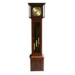 A modern longcase clock fitted with a Westminster chime three-train movement, in a mahogany case,