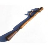 A 19th century turned wooden Truncheon or Persuader of unusual form, being in two parts which are