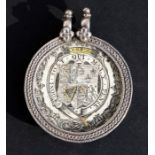 A Georgian white metal amulet / pendant containing a hand coloured engraving of a Coat of Arms, 4.