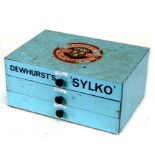 A Dewhurst's 'Sylco' three-drawer sewing reel chest, 30cms (12ins) wide.