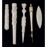 A late 19th century Chinese ivory needle case; together with a cigarette holder; and other items.