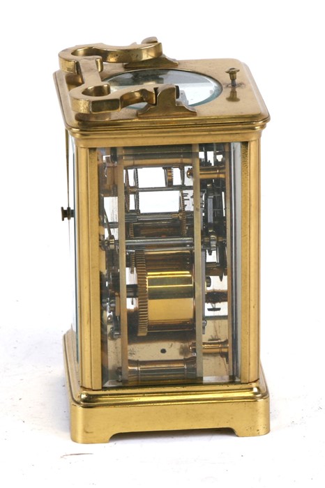 A brass cased repeater carriage clock, the white enamel dial with Roman numerals, the movement - Image 2 of 7