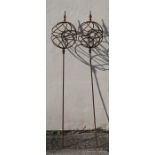 A pair of wrought iron garden obelisks, approx 168cms (66ins) high (2).