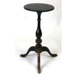 A George III ebonised tripod table of small proportions, 33cms (13ins) diameter.