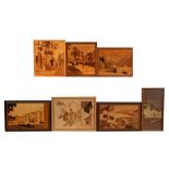 A group of marquetry panels, the largest 36cms (15ins) wide.