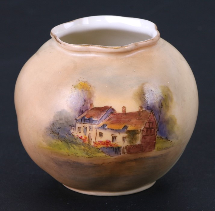 A Royal Worcester blush ivory vase decorated with Anne Hathaway's cottage, 6.5cms (2.5ins) high.