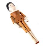 A large peg doll. 30cm (12 ins) high