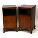 A pair of figured walnut bedside cabinets, 40cms (16ins) wide.