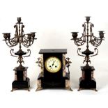 A Victorian black slate clock garniture Condition Reporthas key and pendulum, it does tick but no
