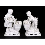 A pair of Meissen style blanc de chine figural groups in the form of a young boy and girl with