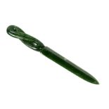 A New Zealand Mauri nephrite jade letter opener with pierced handle, 20cms (8ins) long.Condition