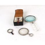 Four Magnifying Glasses including a cased Flat Field Magnifier 5.8cms (2.25ins) diameter