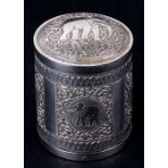 An Indian white metal (test as silver) tea canister caddy with elephant decoration. 9.5cm (3.75 ins)