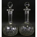 A pair of Victorian oversized cut glass decanters, 36cms (14ins) high.Condition Reportone stopper